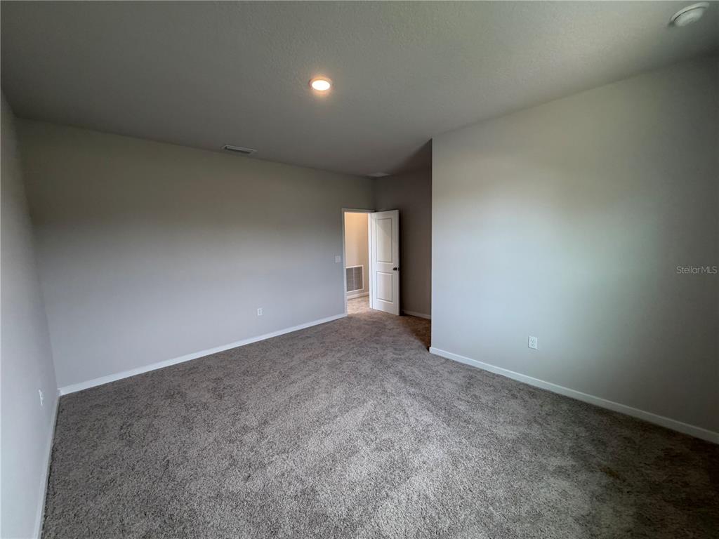 57 Pegasus Road Flagler Beach, FL 32136 - Photo 31 of 45 a view of an empty room and window