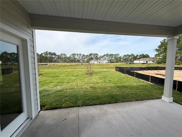 a view of a lake from a yard