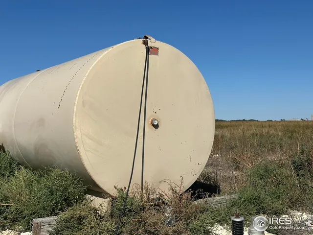 a view of a swimming pool with mountain and in background