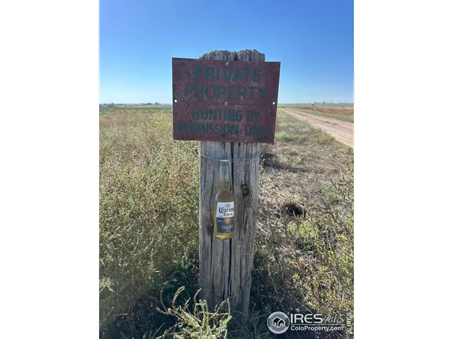 a sign board with parking space