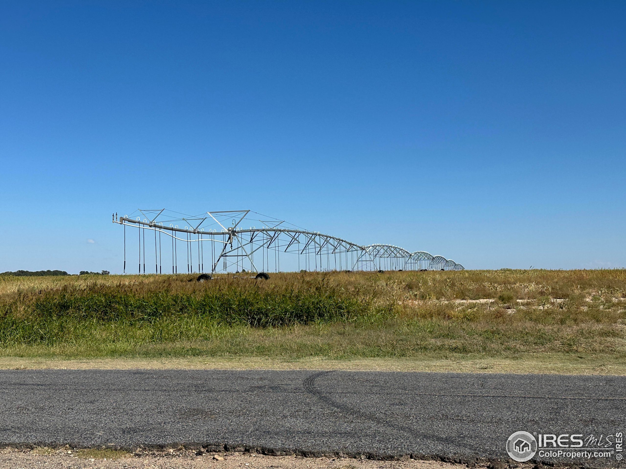 89 Hh Roads, Unit 11 Holly, CO 81047 - Photo 9 of 18 a view of a road with an ocean beach
