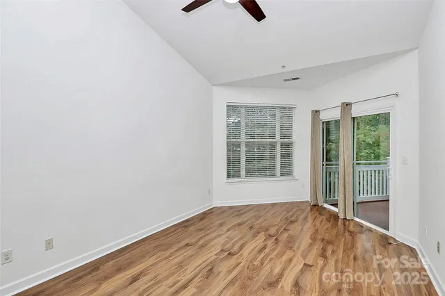 an empty room with a empty space and a window