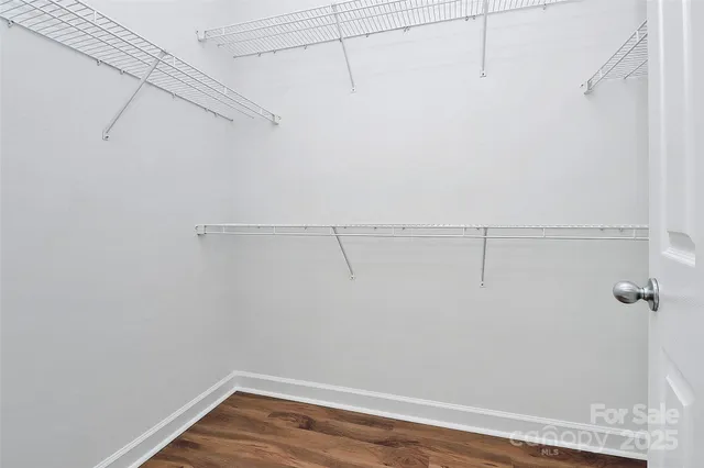 a view of a room with racks on the wall