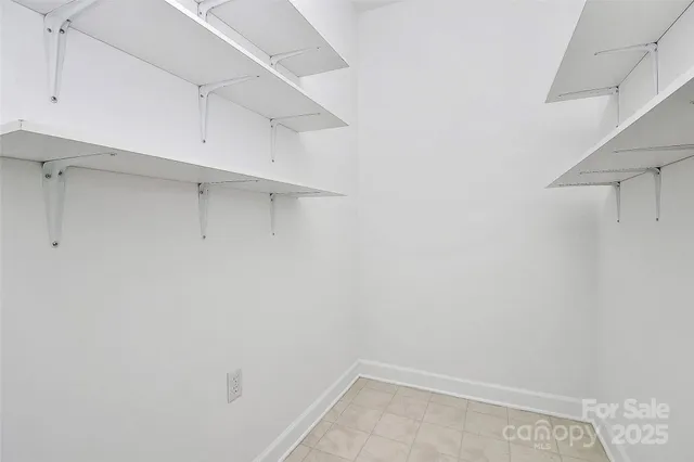 a view of an empty walk in closet