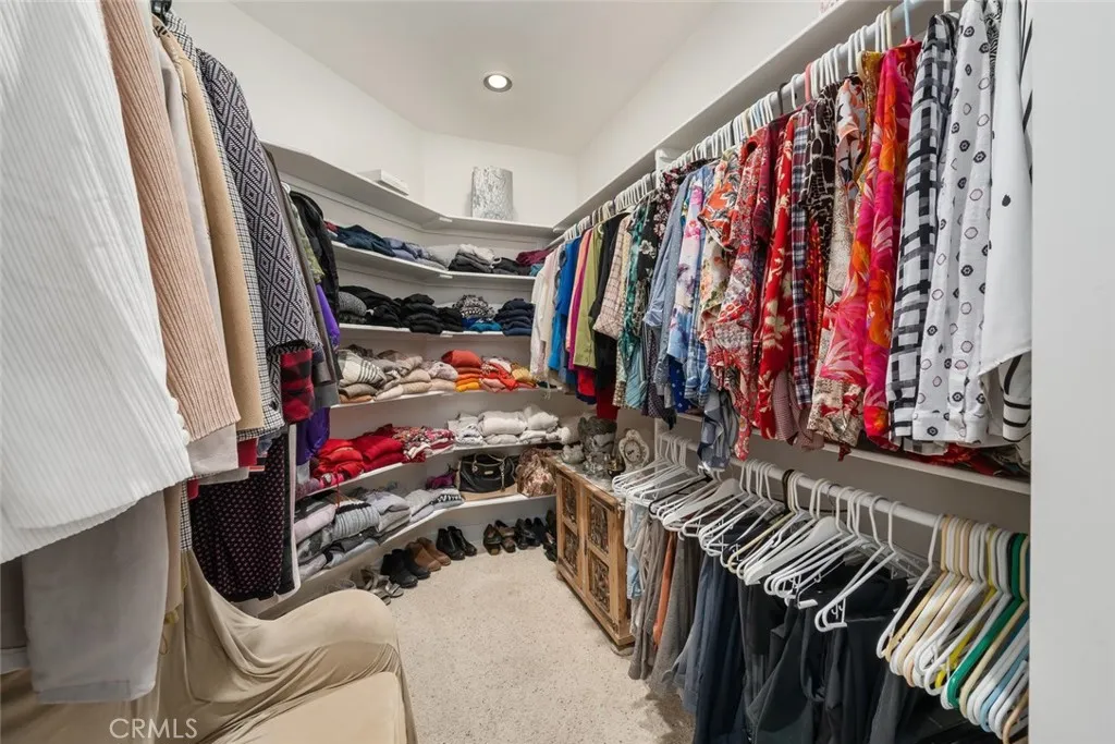 6172 Hawk Ridge Place Paso Robles, CA 93446 - Photo 37 of 72 a view of walk in closet with clothes and shoes