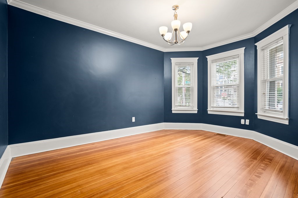226 East Cottage Street, Unit 1 Boston, MA 02125 - Photo 8 of 12 a view of an empty room with a window