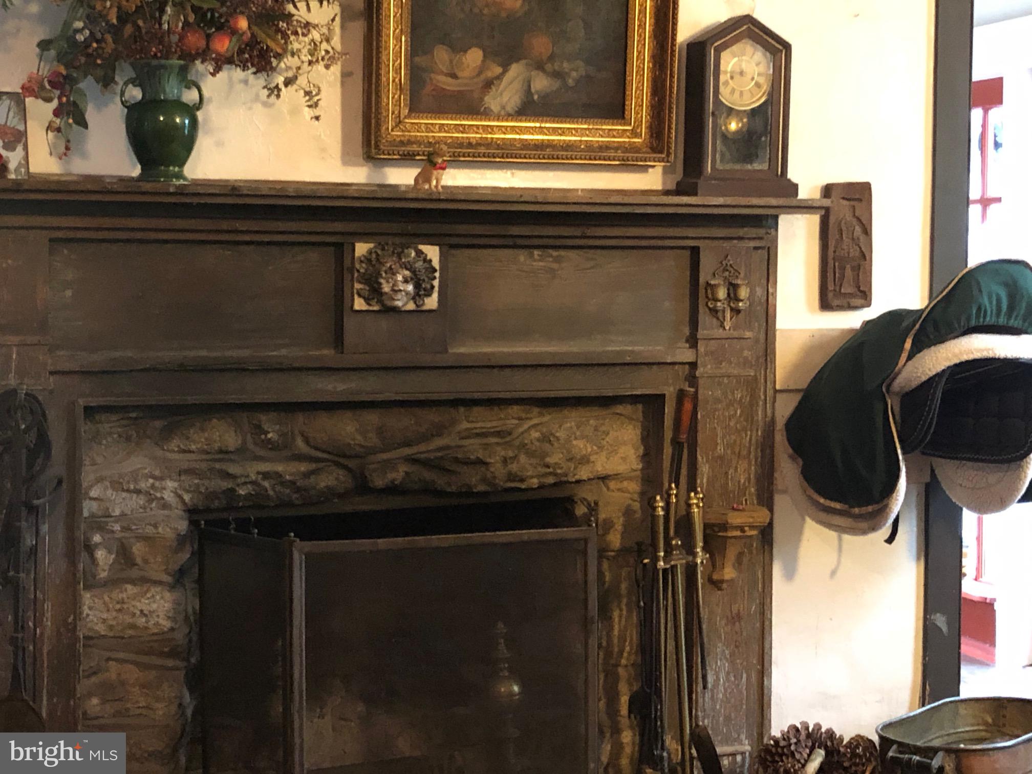 3131 Slate Mills Road Sperryville, VA 22740 - Photo 27 of 105 Nothing better than a fireplace in the kitchen!