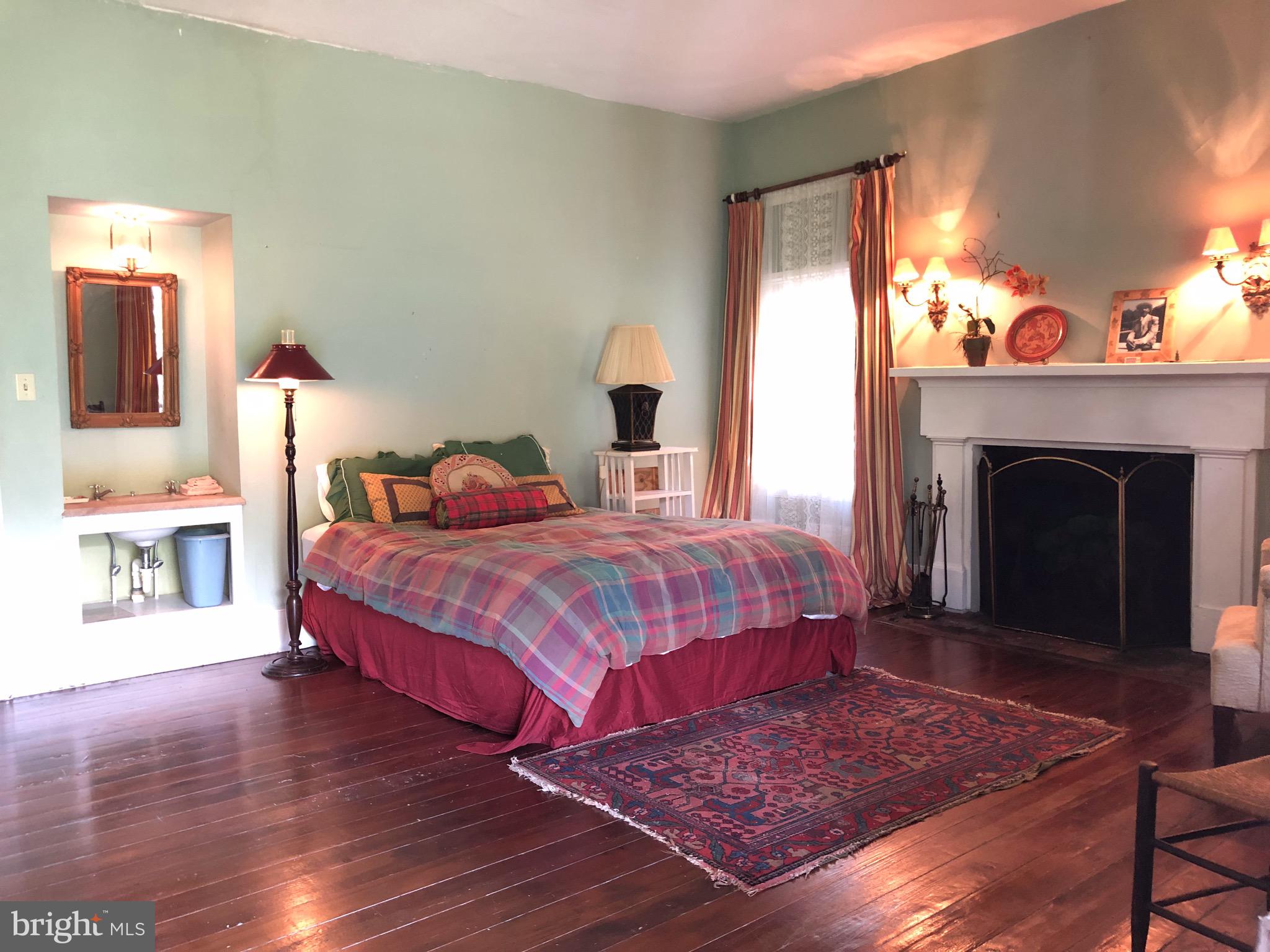 3131 Slate Mills Road Sperryville, VA 22740 - Photo 41 of 105 "Uncle Sim's Room" has a fireplace and porch