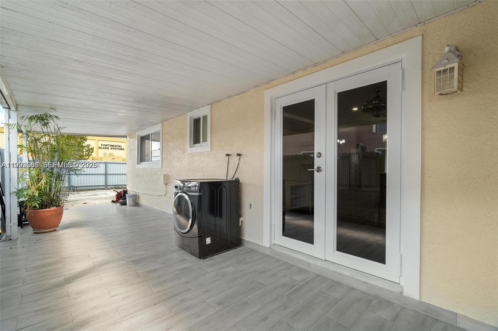 330 West 74th Place, Unit 330 Hialeah, FL 33014 - Photo 12 of 31 a view of a livingroom with furniture and windows
