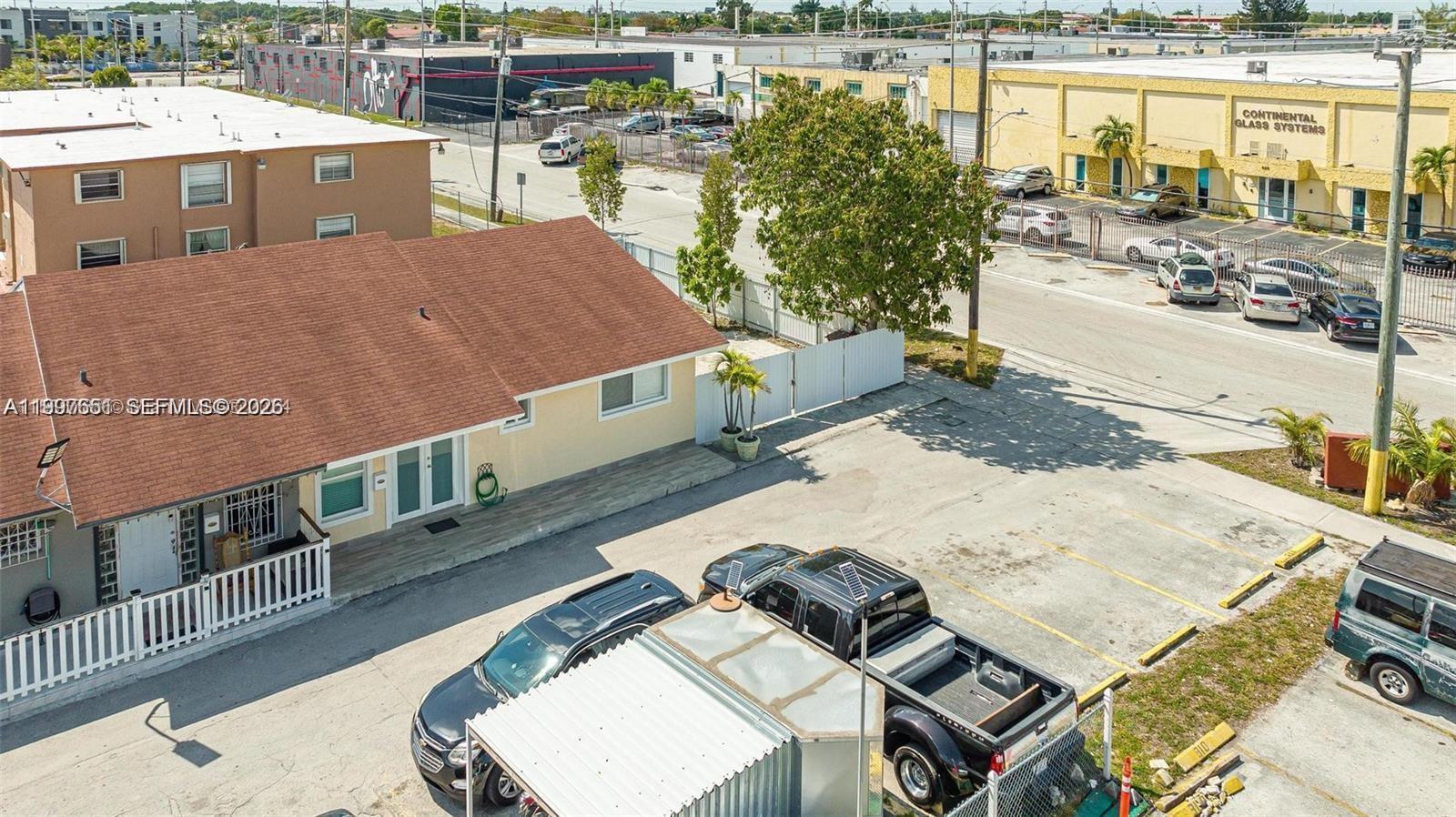 330 West 74th Place, Unit 330 Hialeah, FL 33014 - Photo 30 of 31 a view of a balcony with chairs