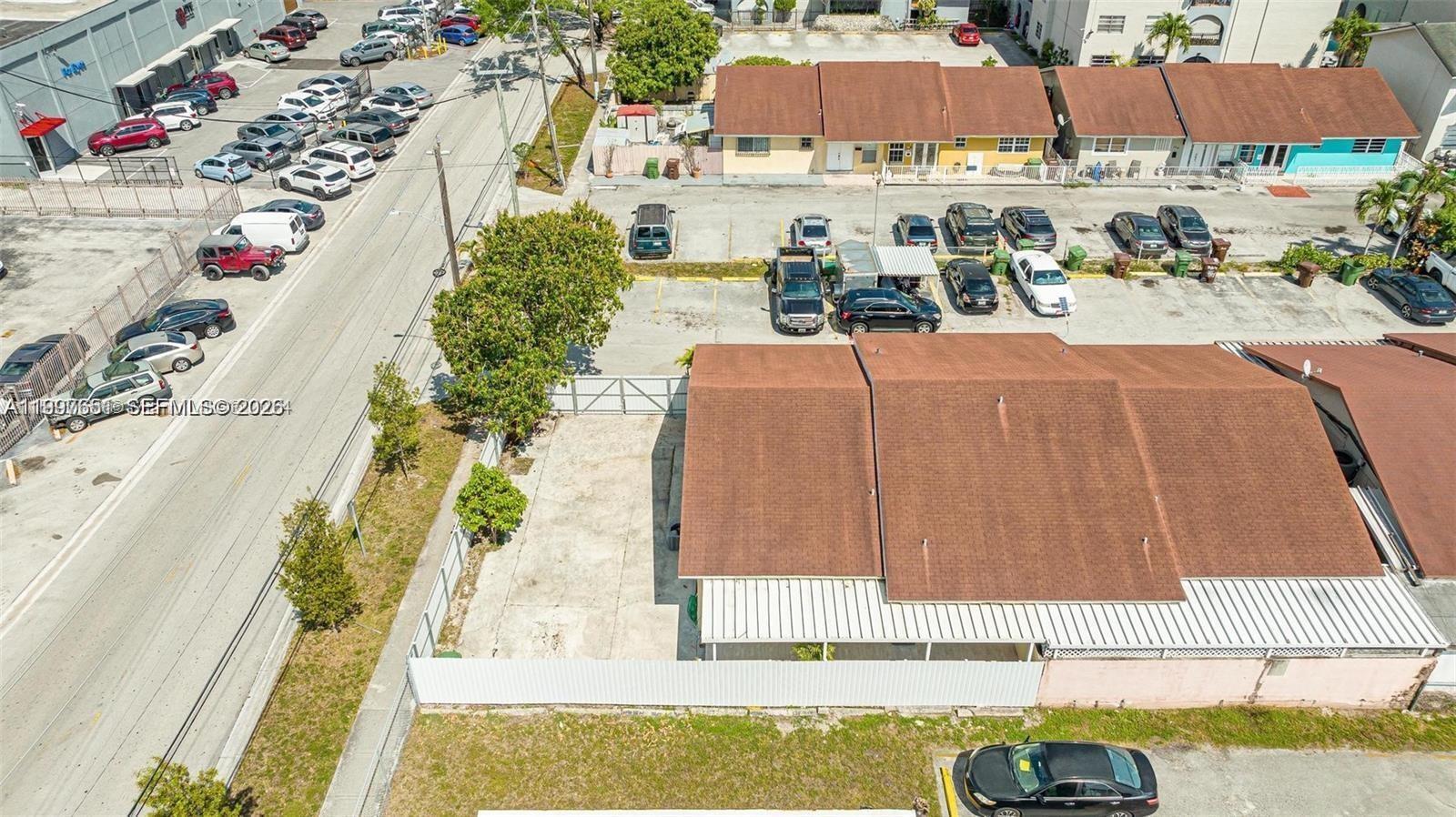 330 West 74th Place, Unit 330 Hialeah, FL 33014 - Photo 4 of 31 an aerial view of a house with a swimming pool