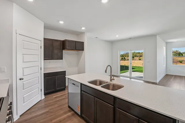 a kitchen with a stove and a microwave