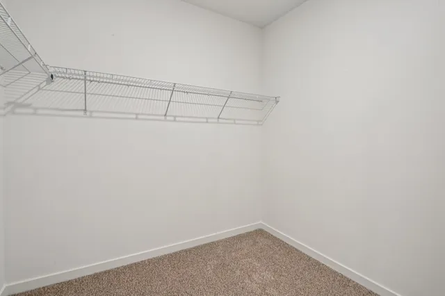 a view of backyard with seating space