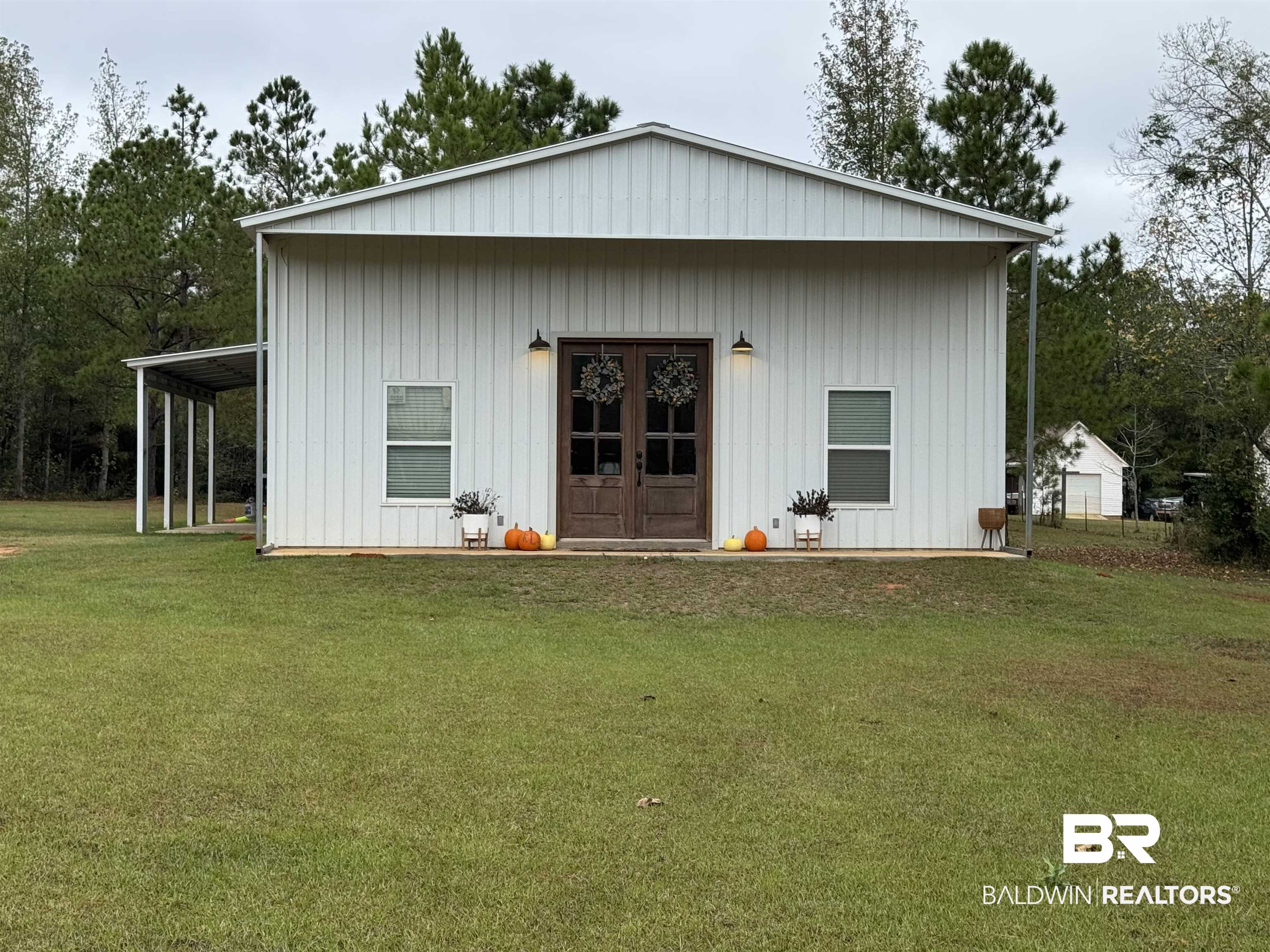 370 Dianne Road Frisco City, AL 36445 - Photo 1 of 41 Front of property with a lawn