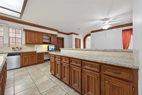 a view of entryway and hallway with a front door