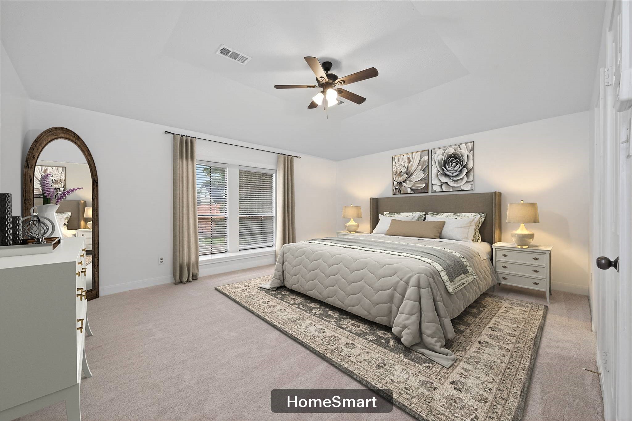 17315 Rothko Lane Spring, TX 77379 - Photo 31 of 50 Spacious bedroom featuring vaulted ceilings, new carpet, and abundant natural light. Designed for comfort and relaxation with an open, airy feel and elegant ambiance. Virtually staged to help you with your Décor ideas.