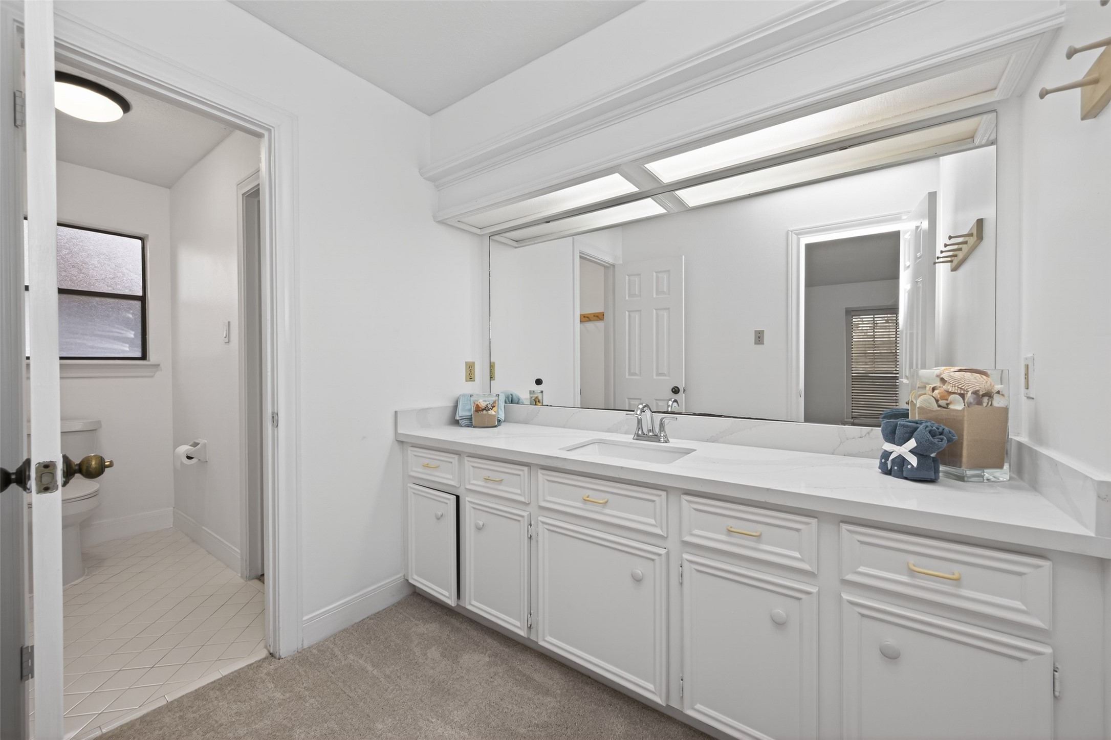 17315 Rothko Lane Spring, TX 77379 - Photo 32 of 50 Bright and elegant bathroom featuring a spacious vanity, new quartz countertops, new sink and water feature