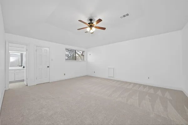 a view of a house with backyard and porch