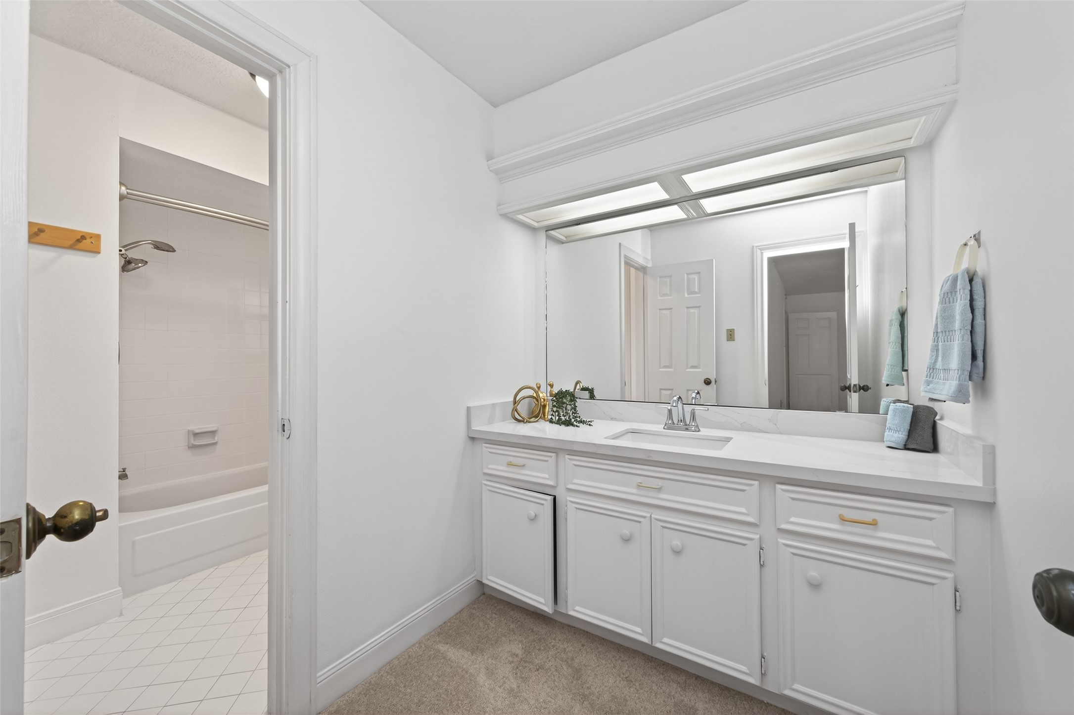 17315 Rothko Lane Spring, TX 77379 - Photo 35 of 50 Bright and elegant bathroom featuring a spacious vanity, new quartz countertops, new sink and water feature