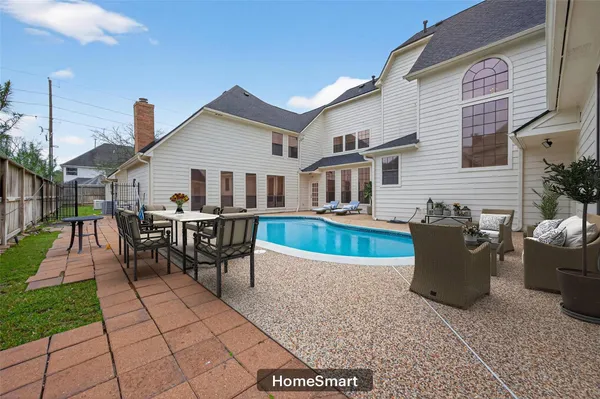 a gym room with lots of furniture