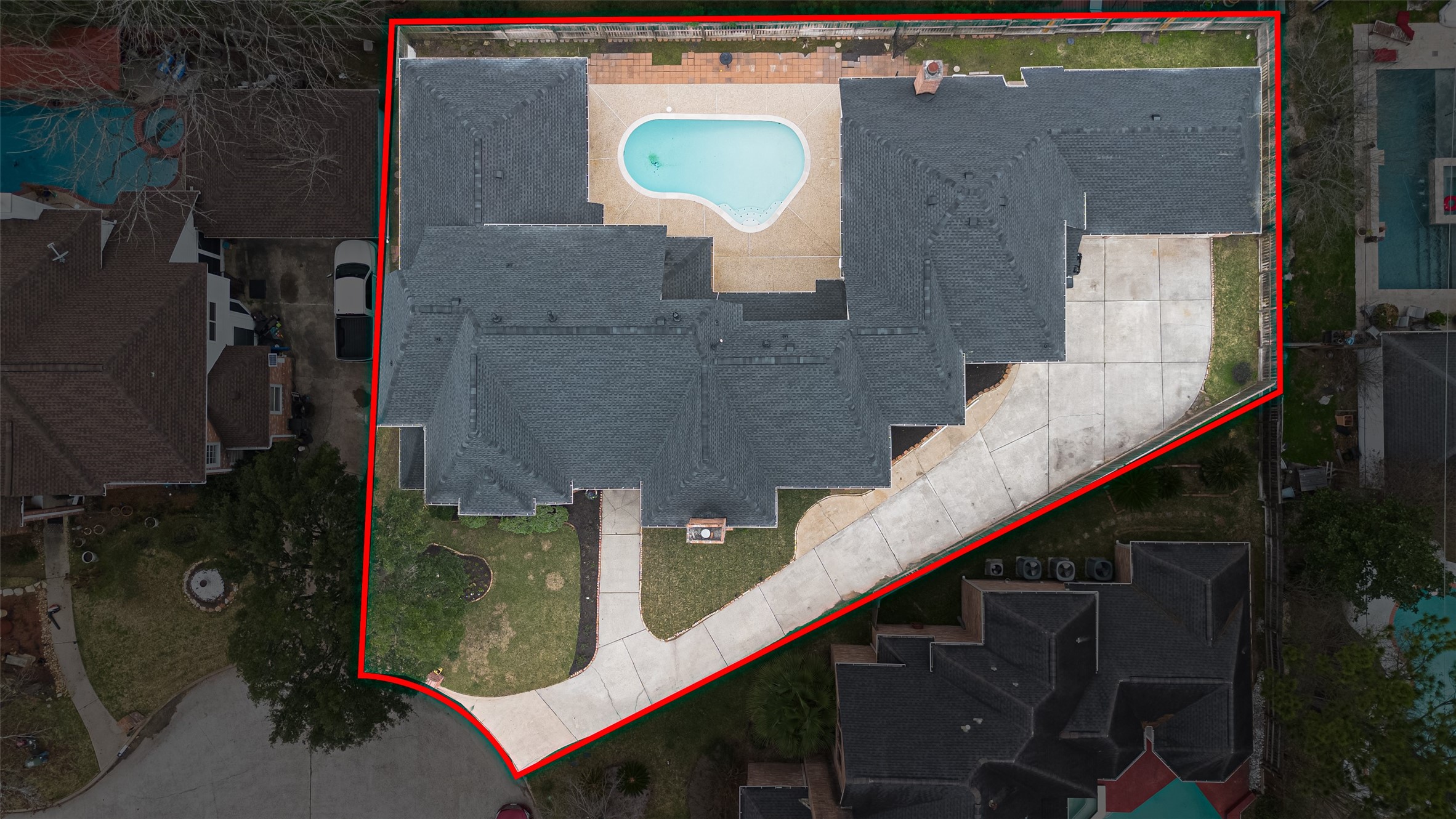 17315 Rothko Lane Spring, TX 77379 - Photo 4 of 50 This property features a spacious layout with a beautifully designed outdoor area, including an in ground pool and expansive patio space perfect for entertaining and relaxation.