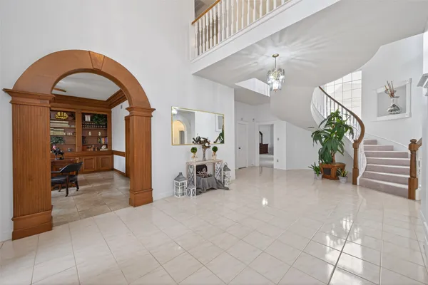 a view of gallery with wooden floor