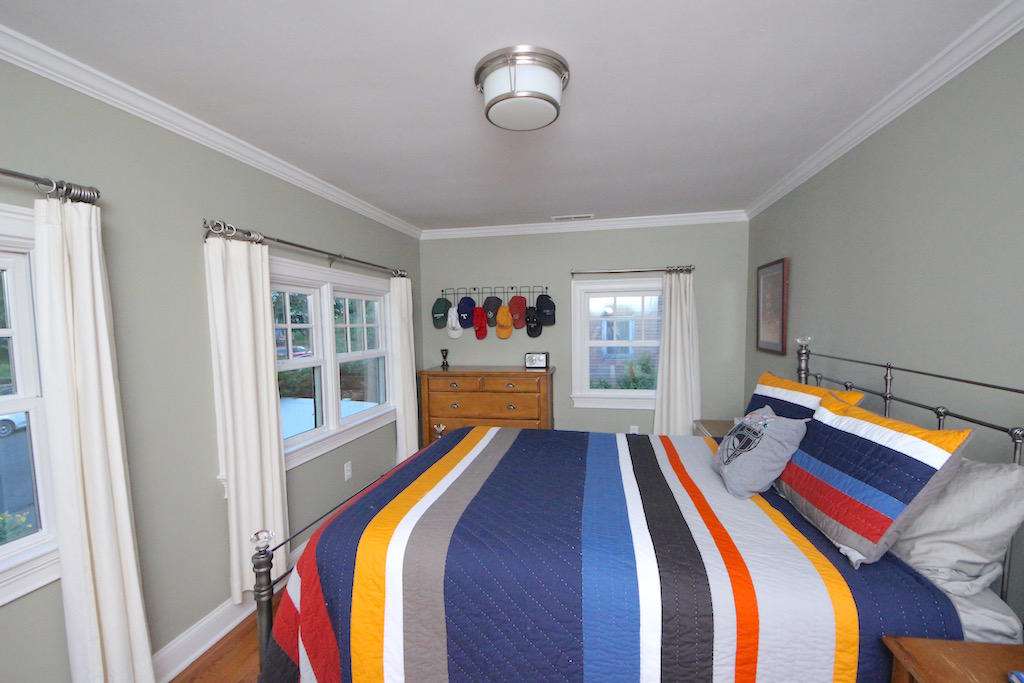 25 Ridgewood Road Norwalk, CT 06853 - Photo 15 of 37 a bed room with a bed and a window
