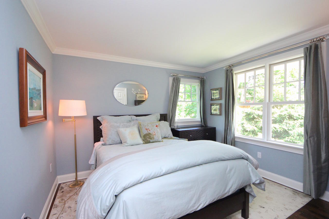 25 Ridgewood Road Norwalk, CT 06853 - Photo 17 of 37 a bedroom with a large bed and a window