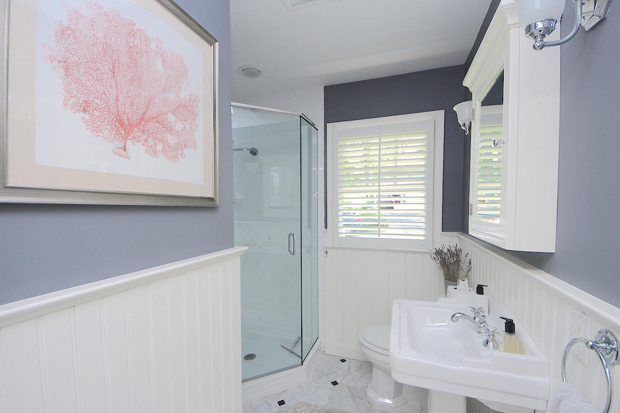 25 Ridgewood Road Norwalk, CT 06853 - Photo 18 of 37 a bathroom with a sink and a bathtub