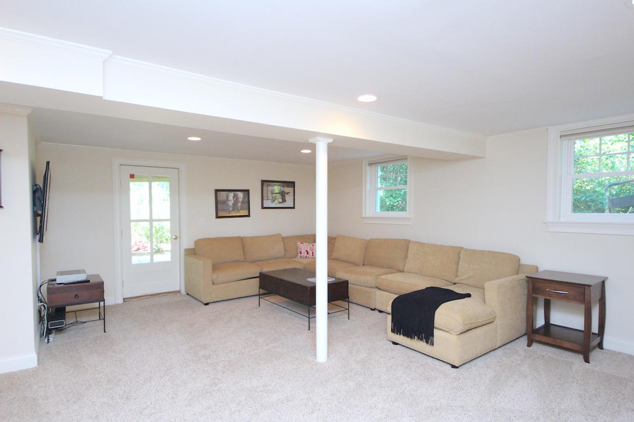 25 Ridgewood Road Norwalk, CT 06853 - Photo 21 of 37 a living room with furniture and a window