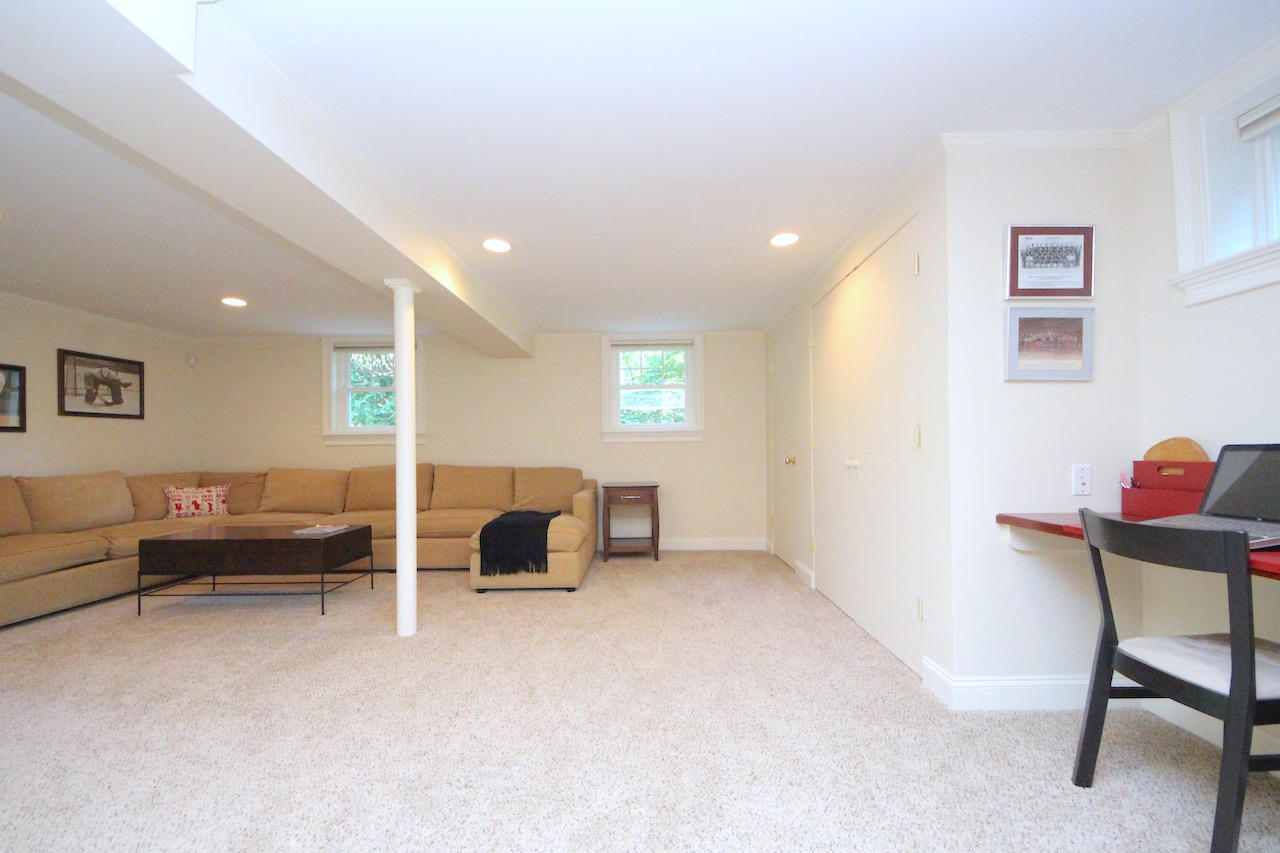 25 Ridgewood Road Norwalk, CT 06853 - Photo 23 of 37 a living room with furniture and a couch