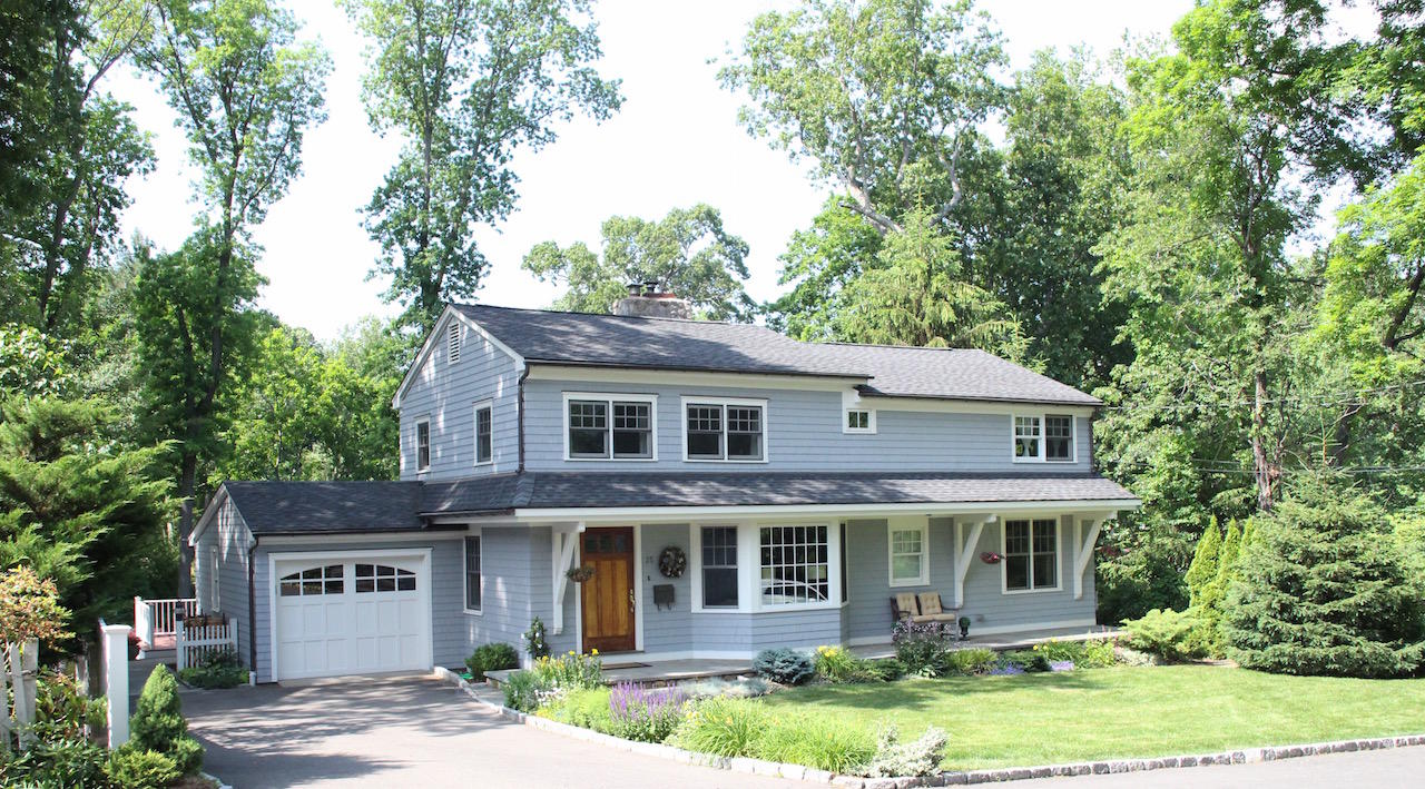 25 Ridgewood Road Norwalk, CT 06853 - Photo 35 of 37 front view of a house with a yard