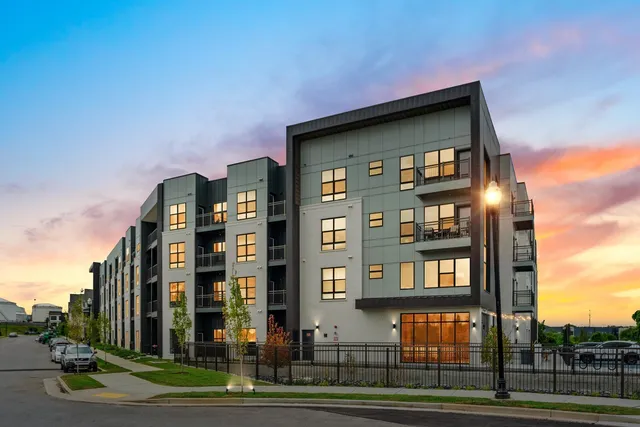 a tall building sitting on the side of a street