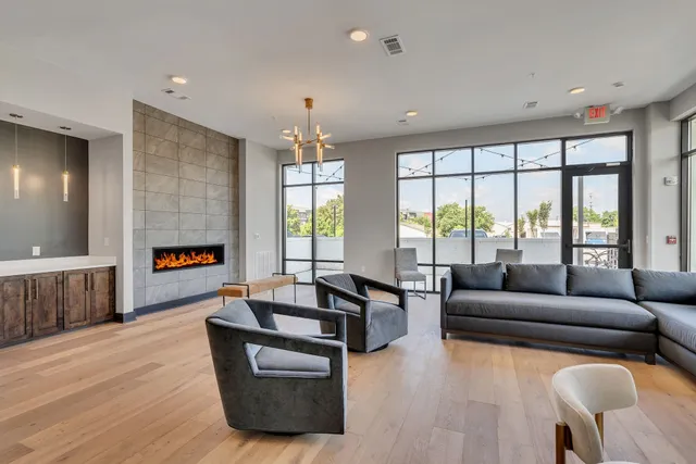 a view of a house with sitting area and furniture