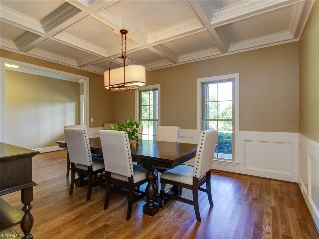 5911 Crutchfield Farm Road Oak Ridge, NC 27310 - Photo 4 of 30 Gather with friends and family in this large Dining Room with Coffered Ceiling.