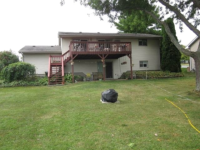 106 Newport Road Lake Summerset, IL 61019 - Photo 17 of 17 a house view with a garden space