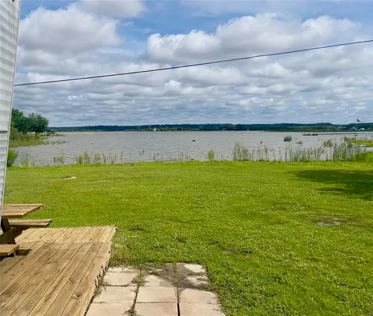 a view of a water pond with an outdoor space