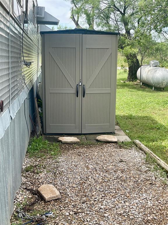 641 Sky Camp Loop, Unit 2 Graford, TX 76449 - Photo 24 of 29 a backyard of a house