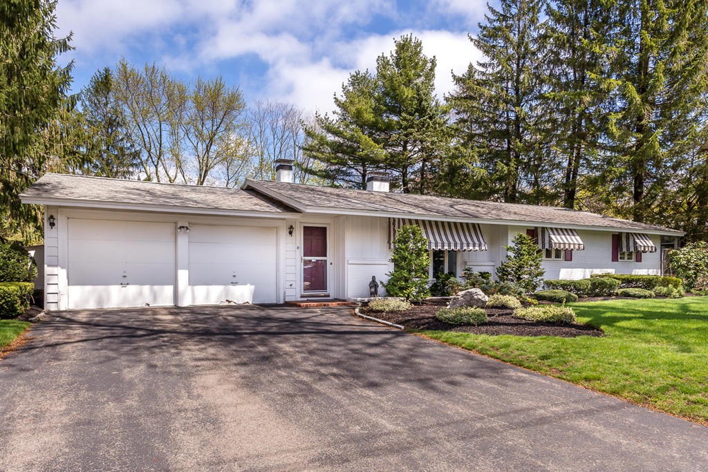 6 Wentworth Road Canton, MA 02021 - Photo 1 of 16 a front view of a house with swing and slide