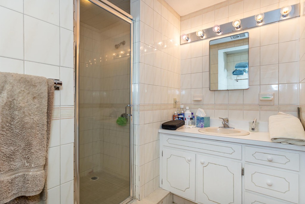 6 Wentworth Road Canton, MA 02021 - Photo 14 of 16 a bathroom with a sink and a mirror