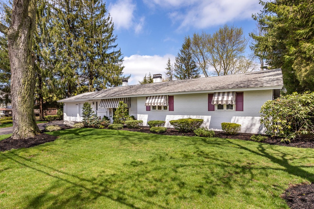 6 Wentworth Road Canton, MA 02021 - Photo 2 of 16 a front view of a house with a garden and trees