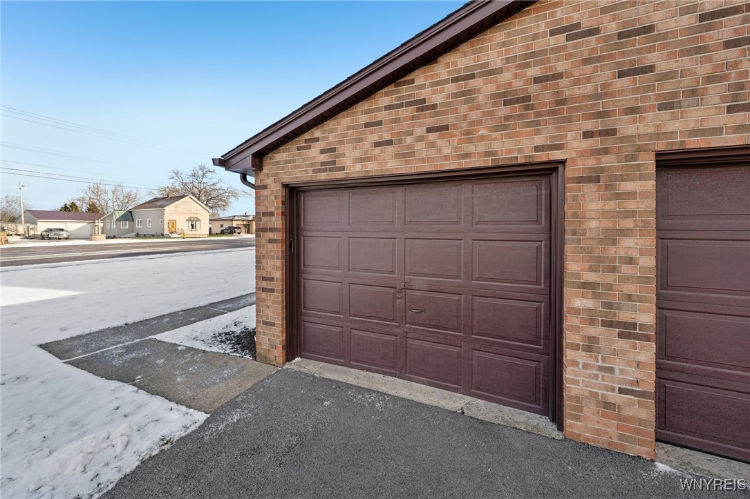 621 French Road, Unit R Cheektowaga, NY 14227 - Photo 3 of 23 Garage on left side