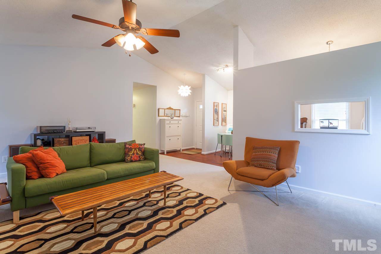 2013 Broadingham Court Raleigh, NC 27615 - Photo 11 of 21 a living room with furniture and a couch