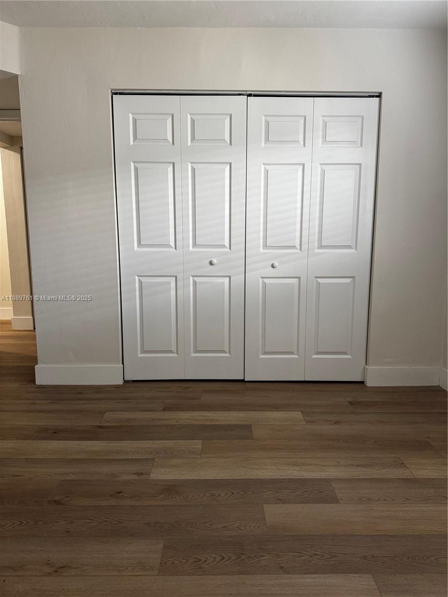 1330 West 29th Street, Unit 30 Hialeah, FL 33012 - Photo 8 of 13 a view of wooden floor