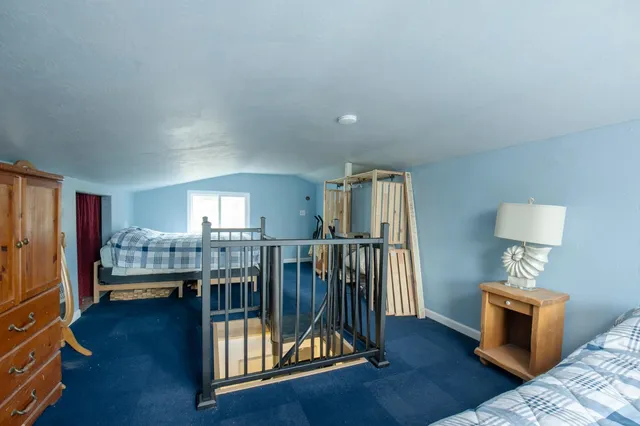 a view of livingroom with furniture and hardwood floor
