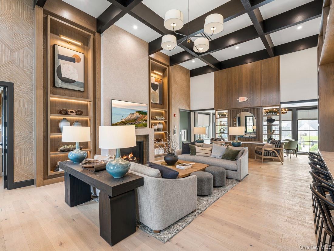 5 Fieldstone Knoll, Unit 45 Armonk, NY 10504 - Photo 15 of 17 a living room with lots of furniture and a large window