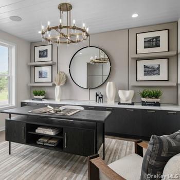 5 Fieldstone Knoll, Unit 45 Armonk, NY 10504 - Photo 7 of 17 a view of a room that has a table and chairs in it