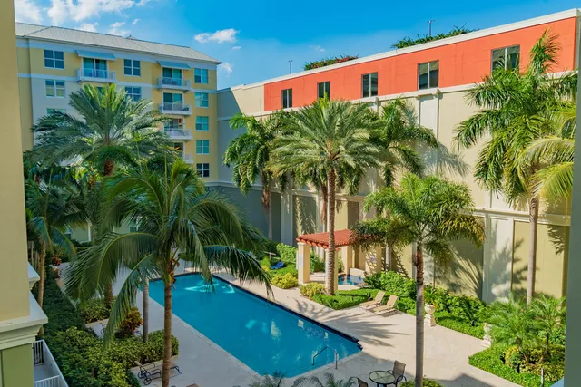 a view of a swimming pool with a garden