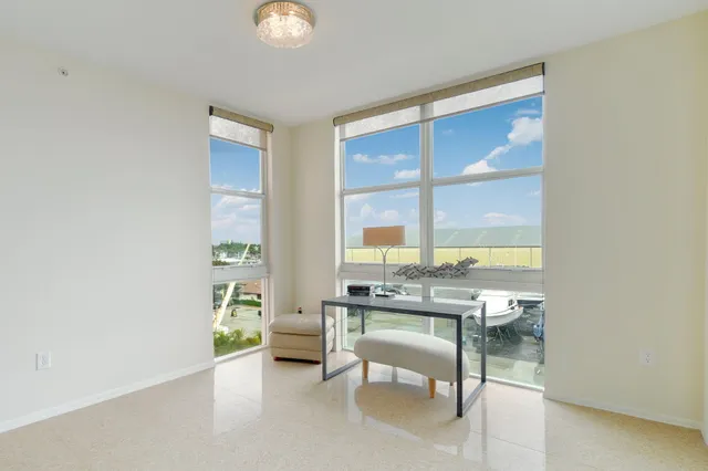 a room with a table and chairs