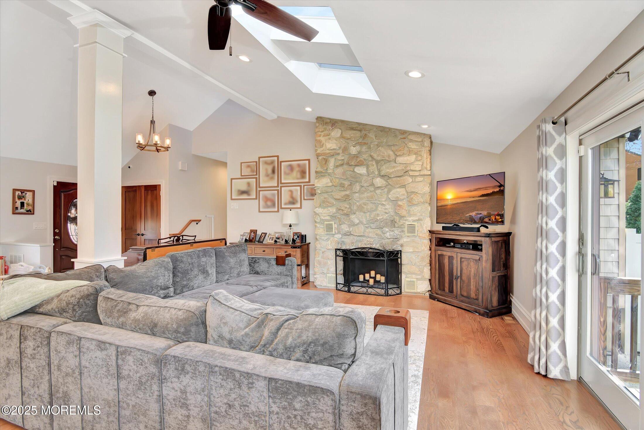 2 Lyndon Lane Howell, NJ 07731 - Photo 16 of 51 a living room with furniture and a fireplace